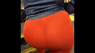  See through orange leggings at train station
